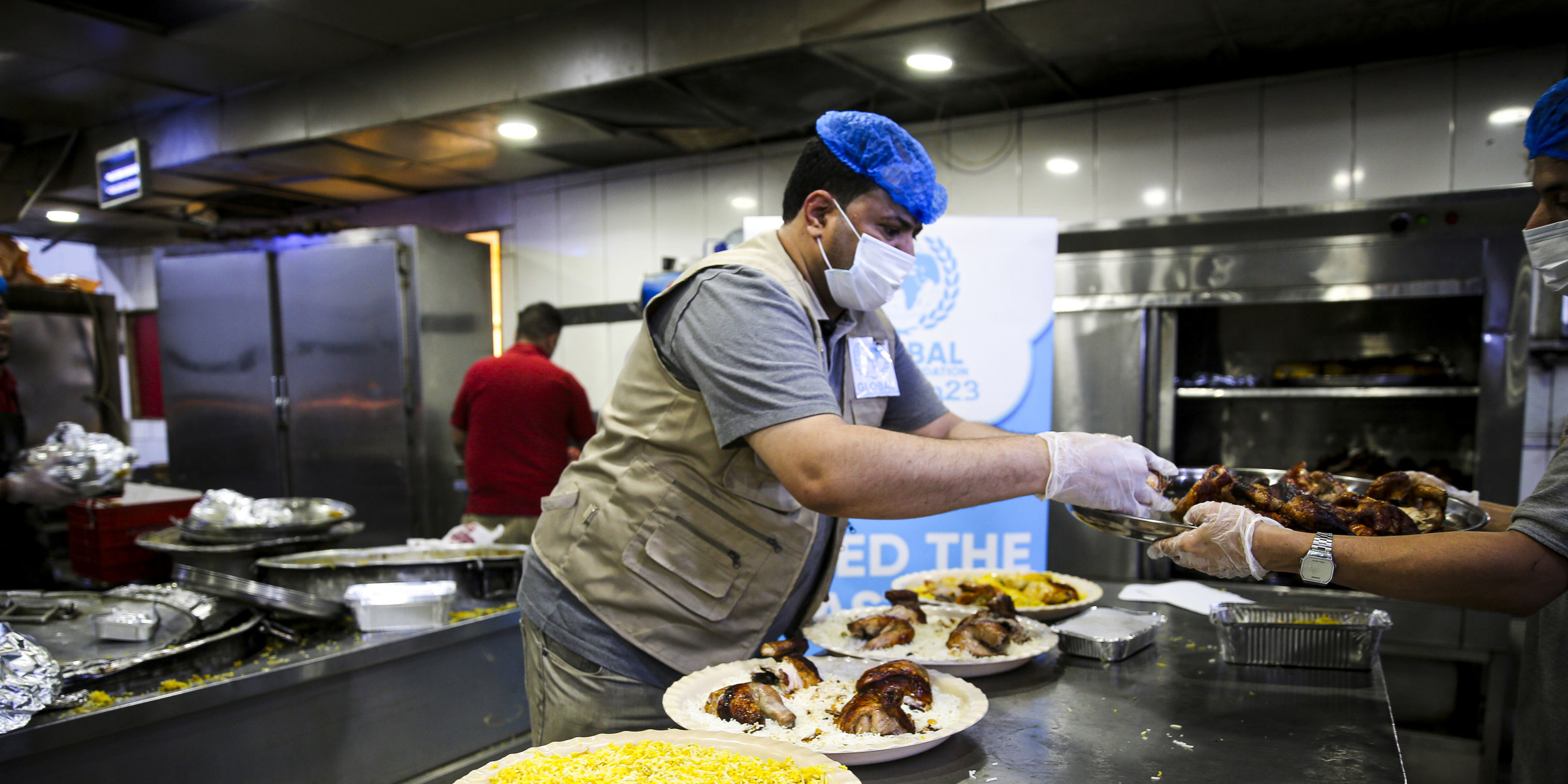 Man distributing food during Ramadan 2024