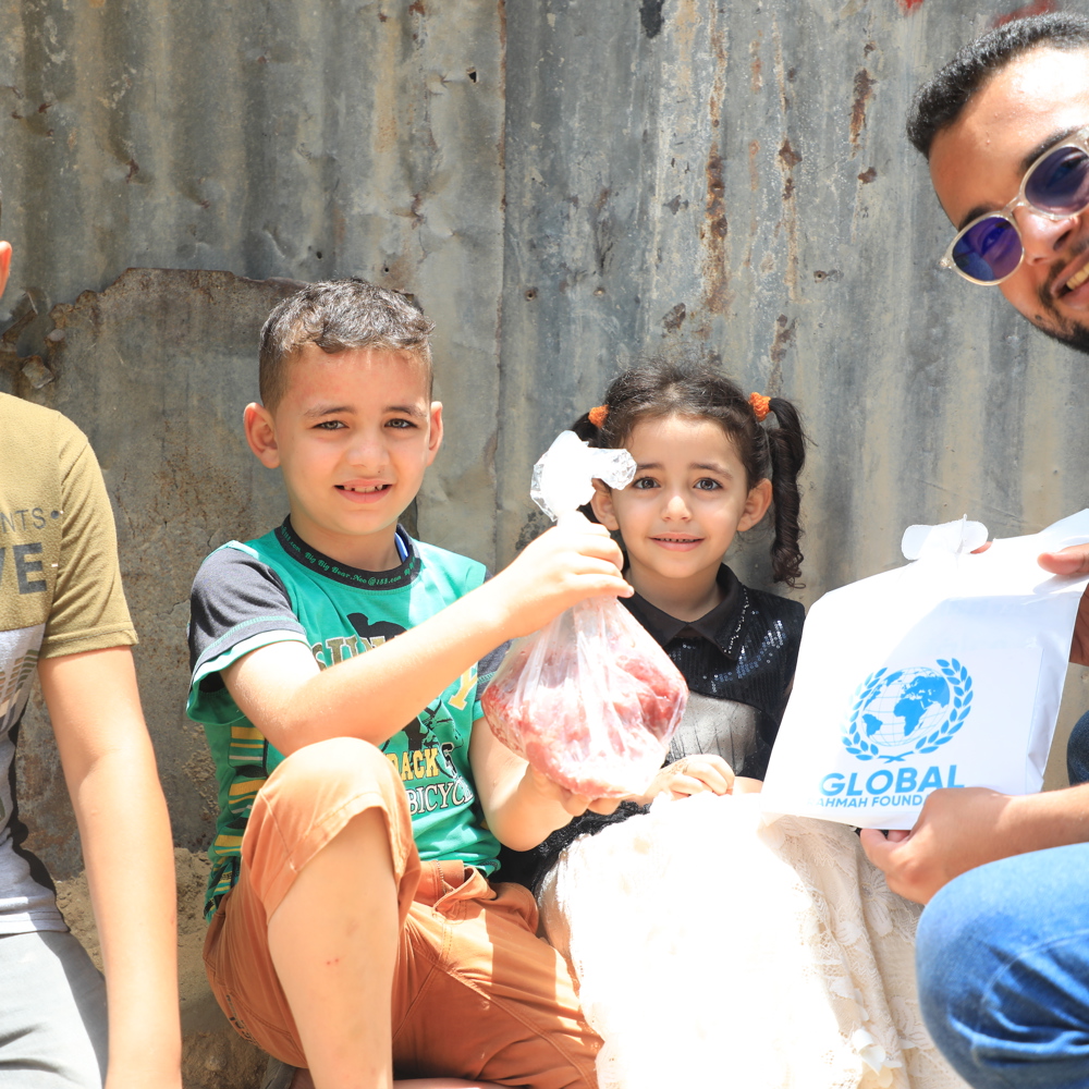 GRF holding Qurbani meat